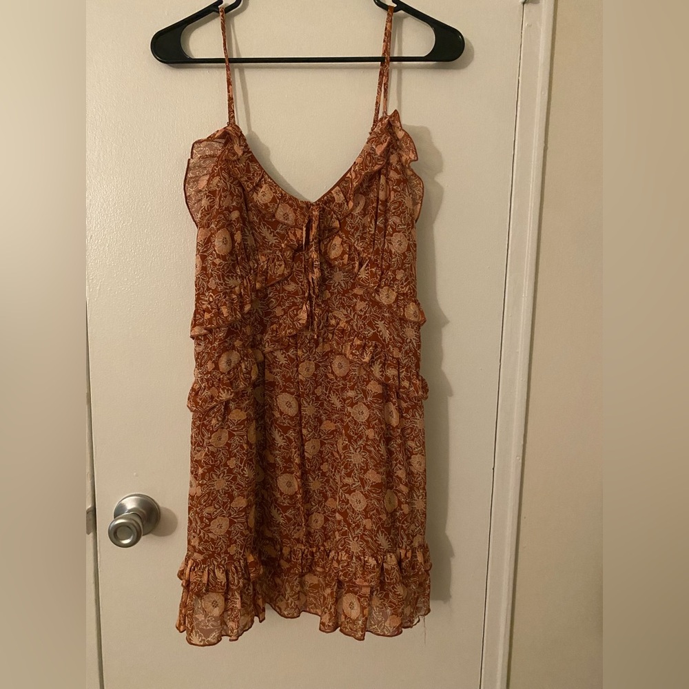 A orange patterned dress from Forever21, it is a size M